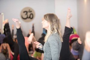 Tricia teaching a class at Yoga Daily